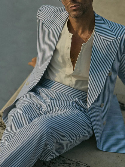 Blue and white striped two-piece suit set with matching blazer and trousers