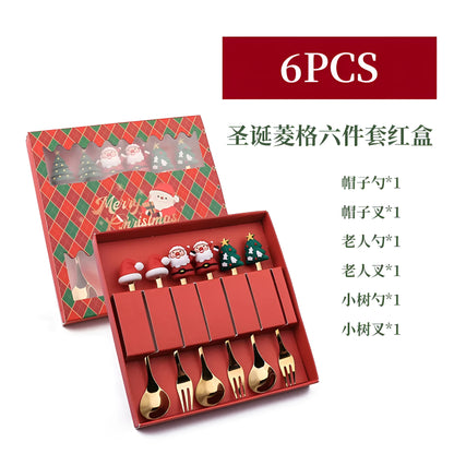 Red-handled stainless steel Christmas spoons and forks with snowman and tree designs.