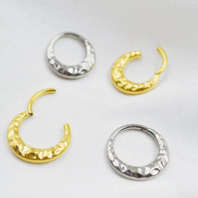 Titanium alloy concave-convex nose ring in gold or silver colour with carved design texture