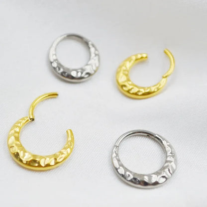 Titanium alloy concave-convex nose ring in gold or silver colour with carved design texture
