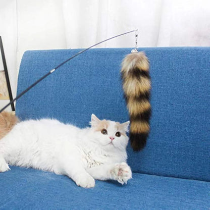 Black cat toy wand with a long elastic string and a feather teaser catcher for interactive play.