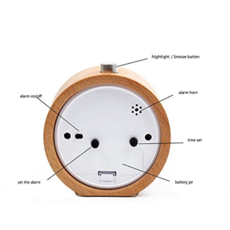 Solid beech wood analog alarm clock with silent snooze on a wooden bedside table