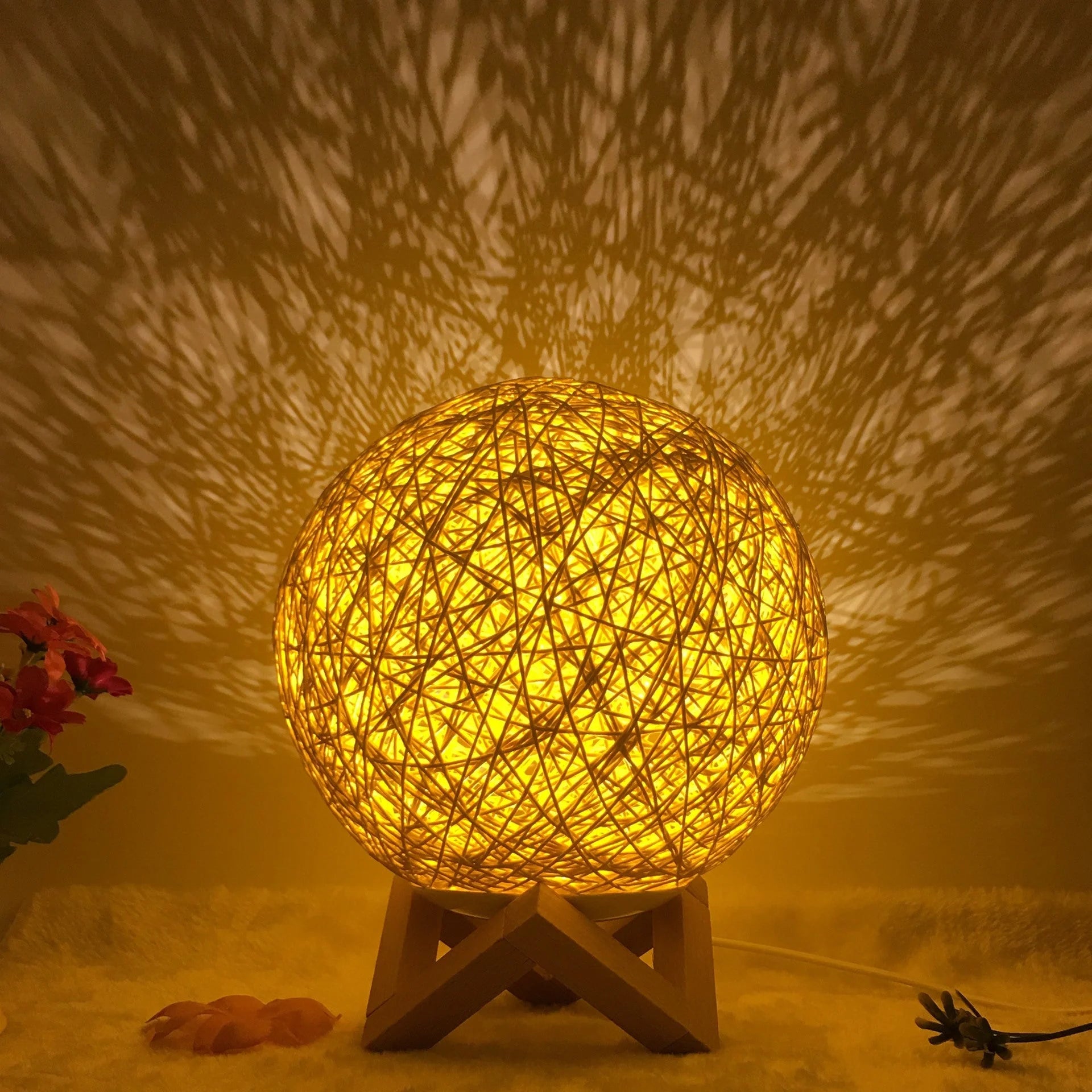 LED rattan table lamp with hand-knit linen shade in various colours