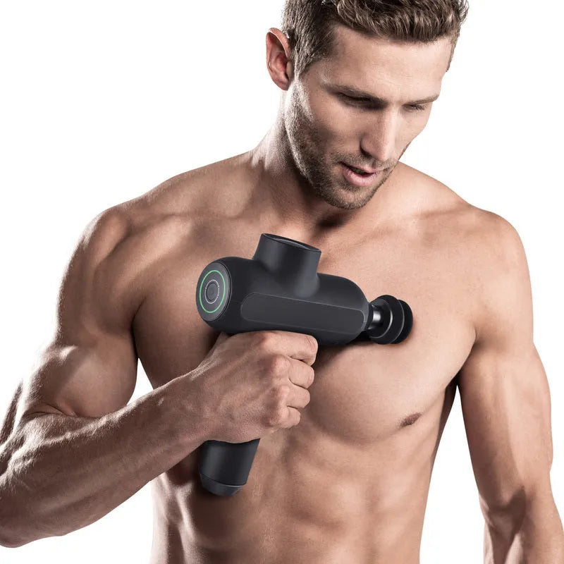 Black rechargeable muscle massager with six interchangeable heads measuring 25x20x6cm