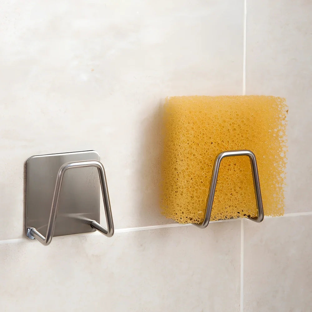 304 stainless steel sponge drain rack measuring 5.5x3.4cm with drainage channels