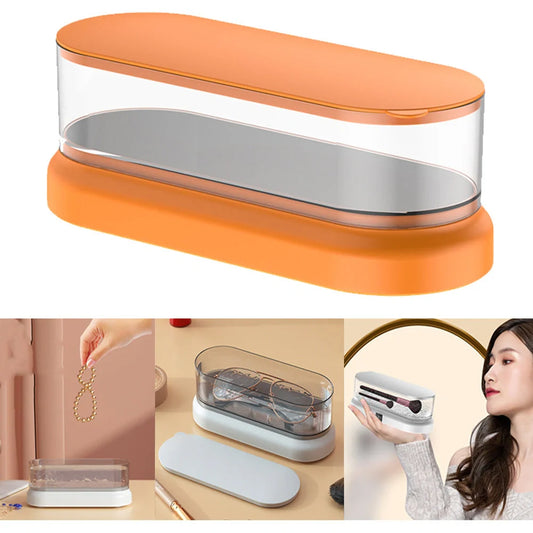 Compact ultrasonic cleaning machine for watches and small items, white colour, on a table