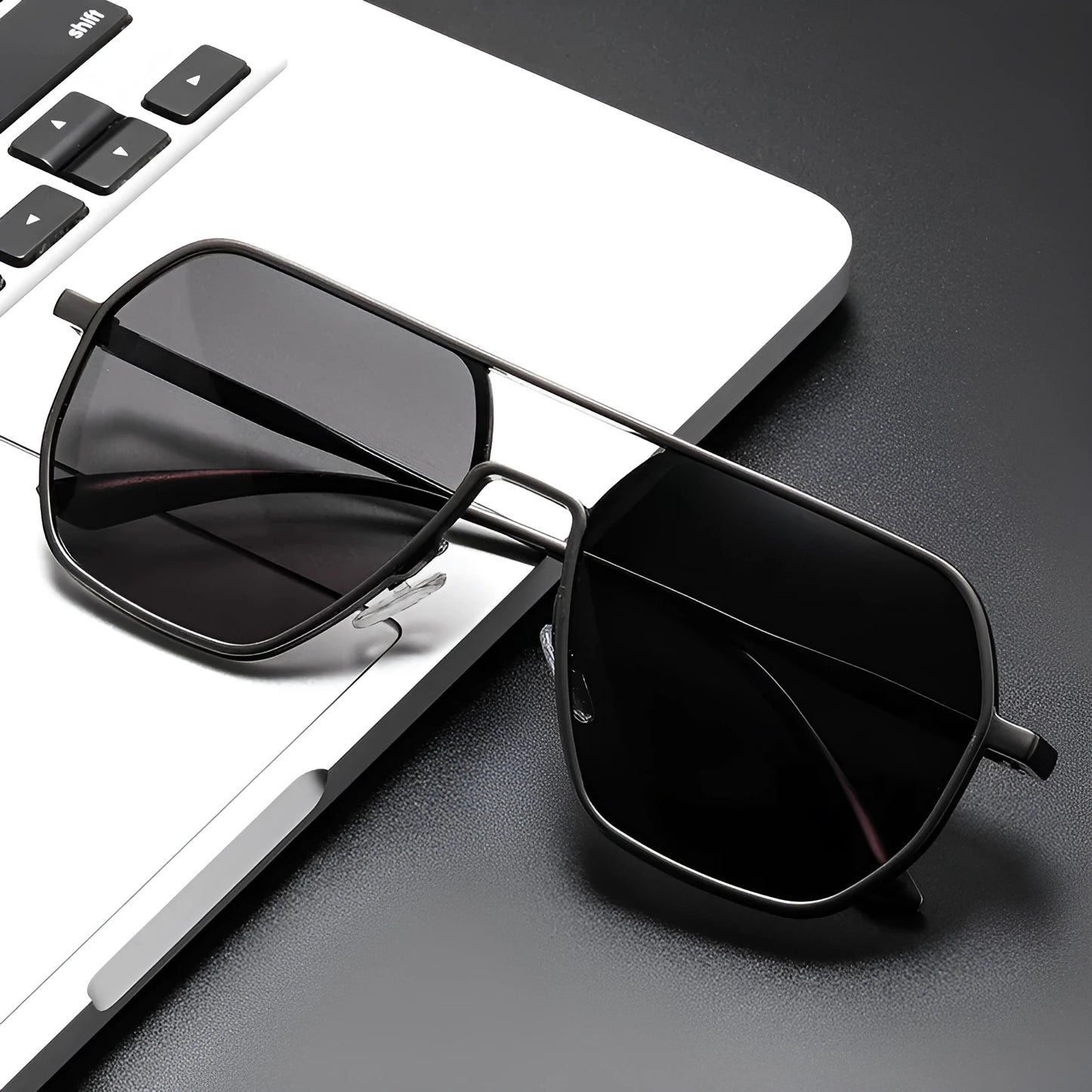 Men's polarised sunglasses with black frame and grey lenses for driving and outdoor sports.