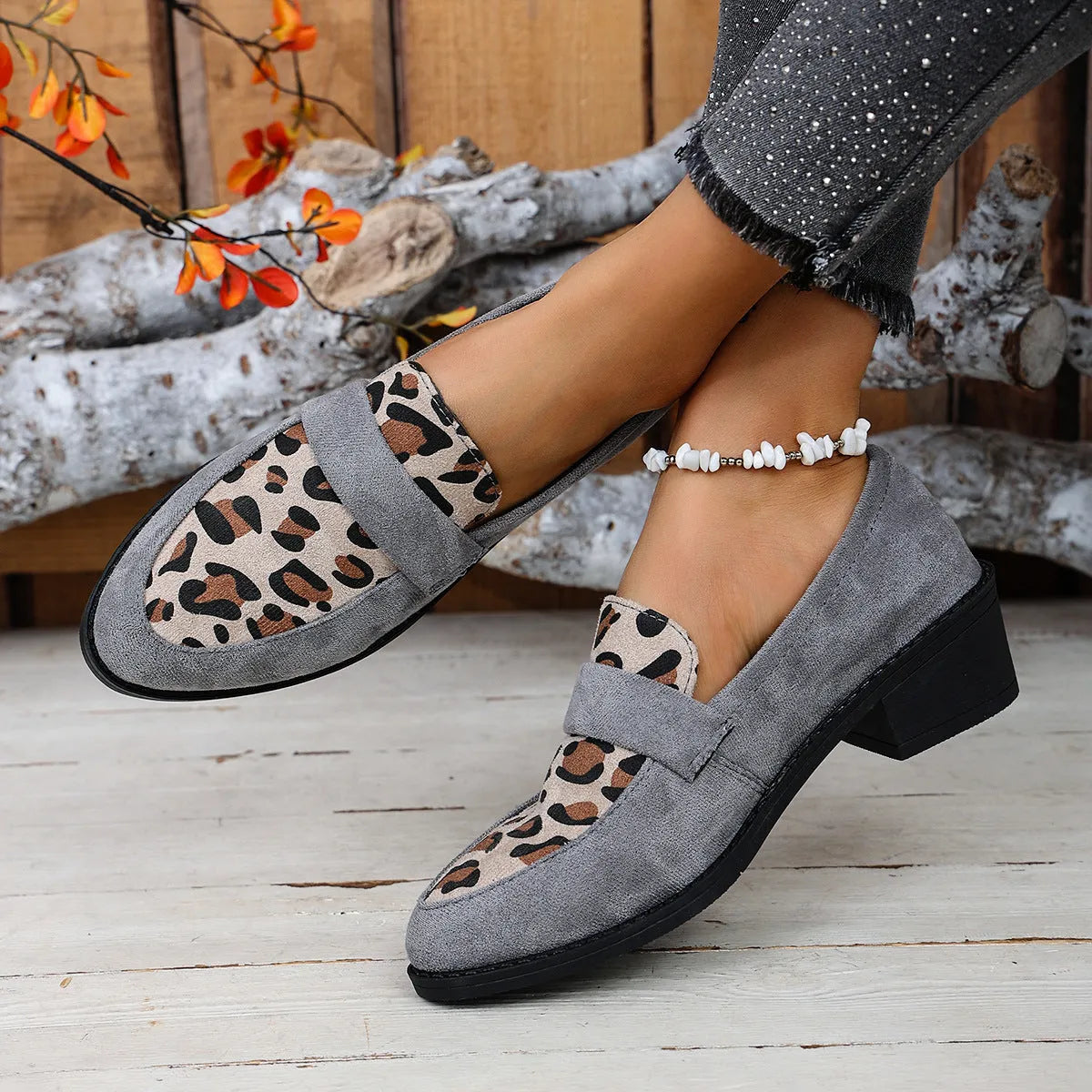 Leopard print slip-on suede pumps with a chunky mid-heel and pointed toe in brown