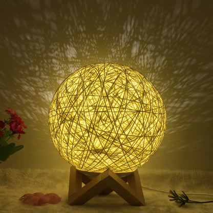 LED rattan table lamp with hand-knit linen shade in various colours