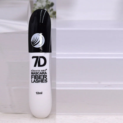 Black 7D mascara tube with brush showing separated lashes in waterproof formula