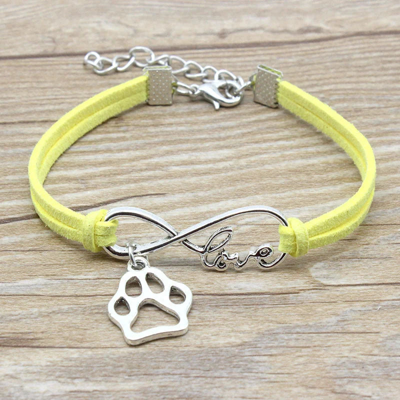 Stylish hand-woven infinite love pet bracelet in various colours, featuring a bow design and made of premium alloy materials