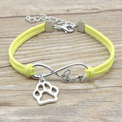 Stylish hand-woven infinite love pet bracelet in various colours, featuring a bow design and made of premium alloy materials