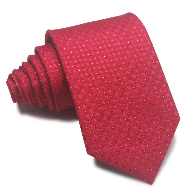 Close-up of a red and black striped men's business tie with a textured Jacquard weave, showing the 8cm width and arrow point shape.