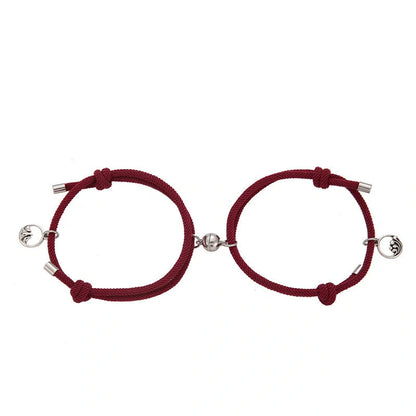 Magnetic couple's bracelet with geometric design and meaningful charms inspired by ancient Chinese tradition