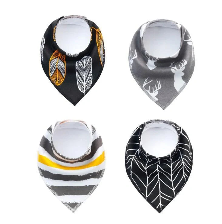 Set of four cotton baby bibs with arrow and wave designs for mess-free feeding