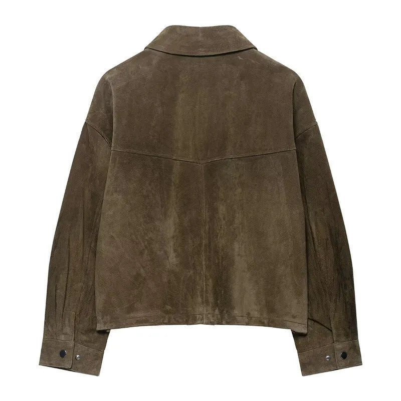 Women's black PU leather-look casual jacket with a relaxed fit, shown on a model.