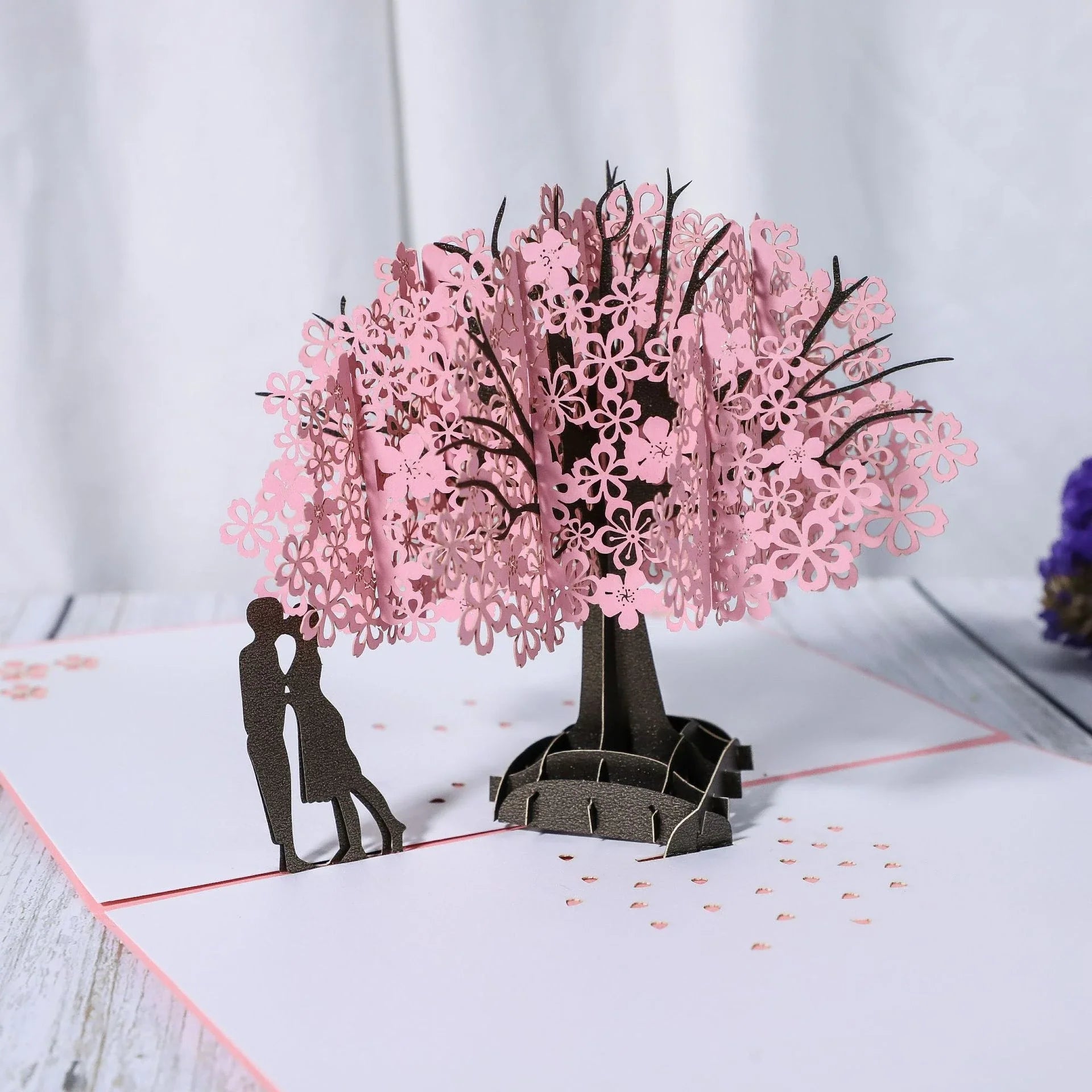 Exquisite 3D pop-up greeting cards for lovers, featuring a variety of romantic motifs like roses, landscapes, and couples.