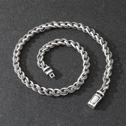 Men's antique silver titanium steel keel chain necklace with large geometric links on a black background.