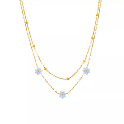 Stainless steel daisy flower jewellery set with necklace, bracelet, and earrings