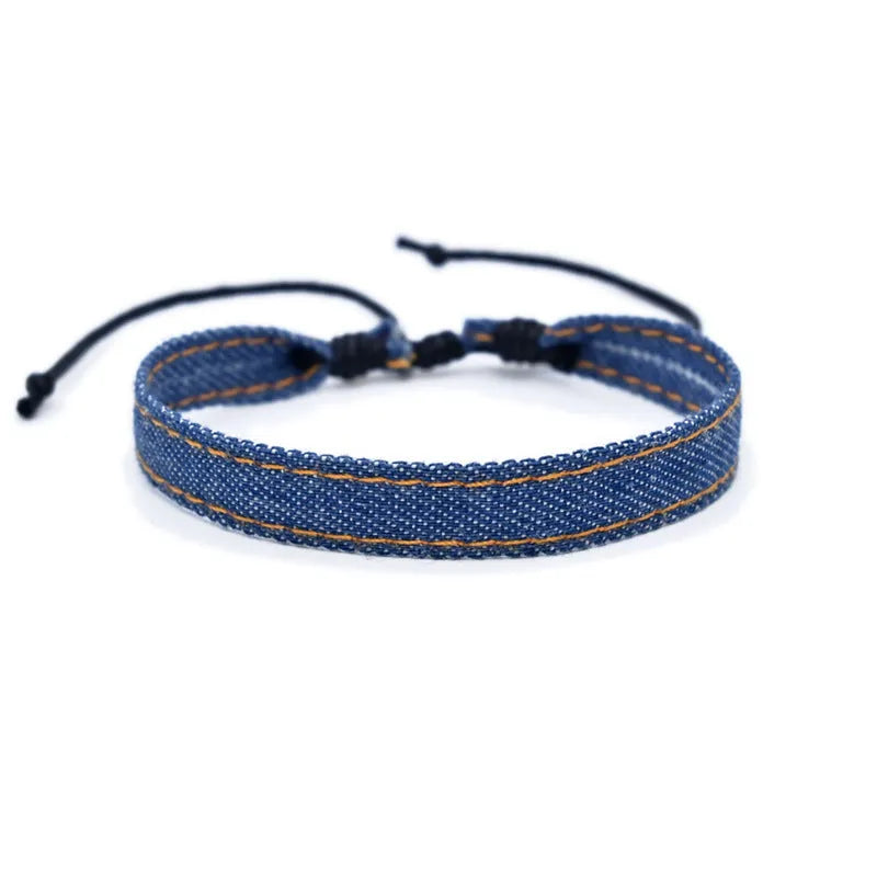 National style denim fabric bracelet carrying strap showing mixed material construction and wristband design
