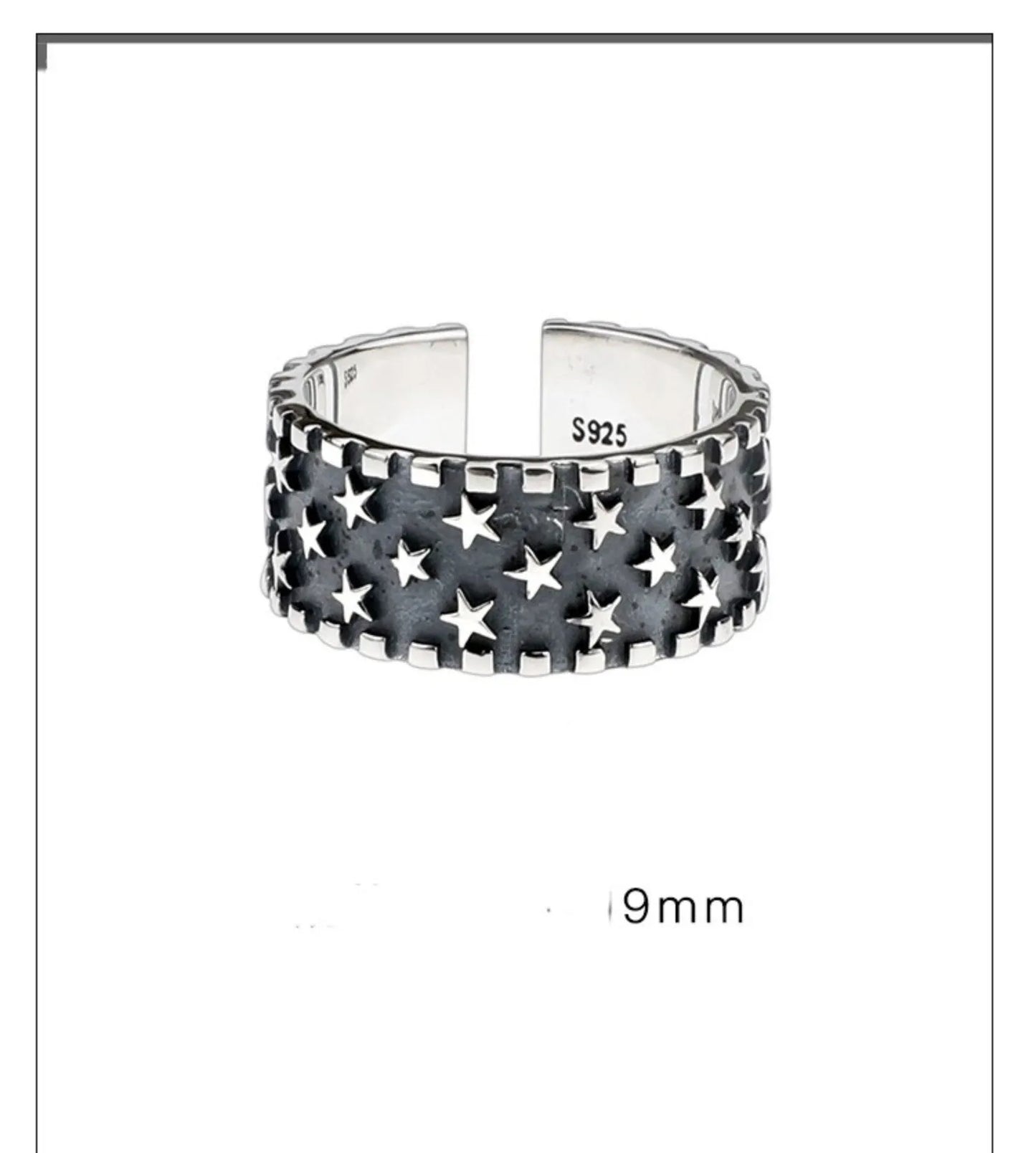 Adjustable sterling silver ring with a geometric pattern of multiple five-pointed stars on a polished band.
