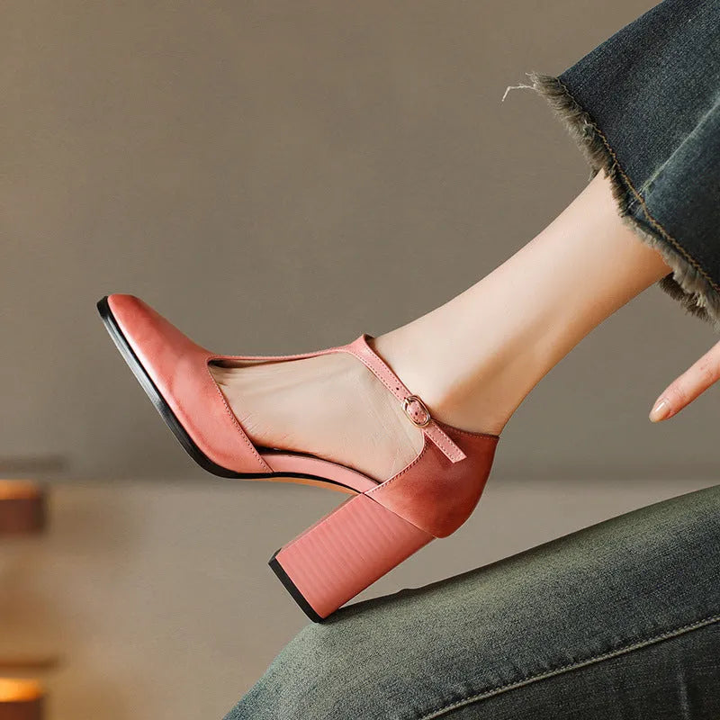 Baotou hollow retro women's Mary Jane shoes in pink with pointed toe and buckle.
