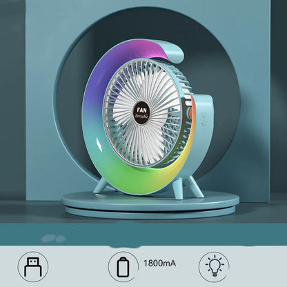Grass green USB desktop fan with night light on a wooden desk