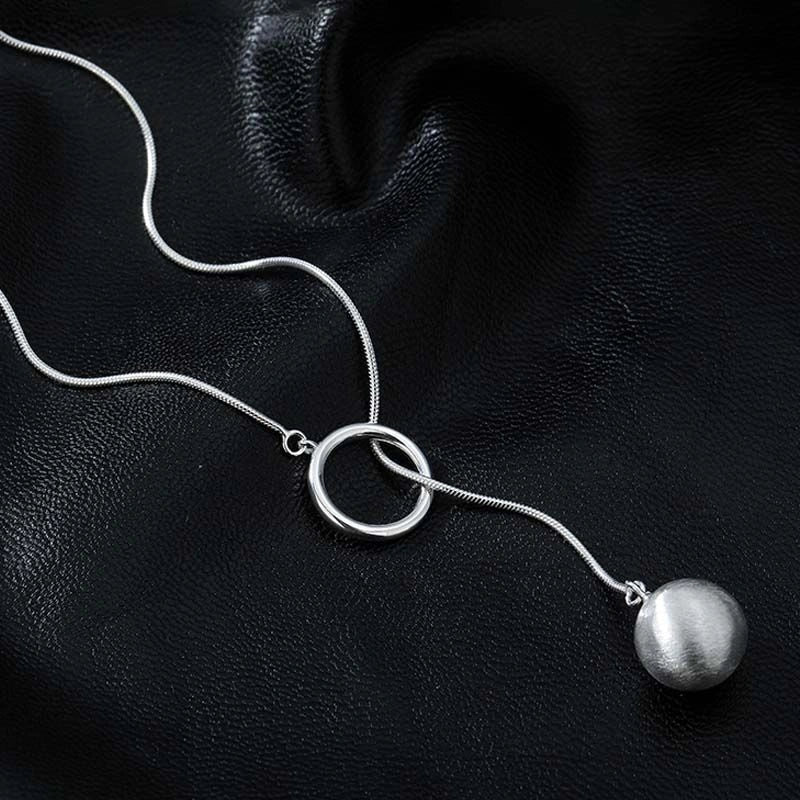 Elegant platinum-plated round ball chain necklace with sleek snake-bone design, a timeless fashion accessory for modern women.