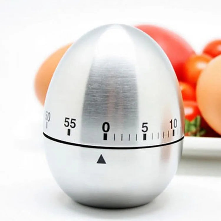 Kitchen timer for cooking with 60-minute mechanical dial and long ring chime, made from stainless steel with an egg pattern design and operating torque of ≤0.45N.m for reliable timing in a 7cm high, 5.5cm diameter size.