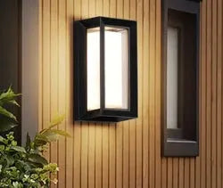 White IP65 waterproof outdoor wall lamp with acrylic shade and optional motion sensor for garden security.