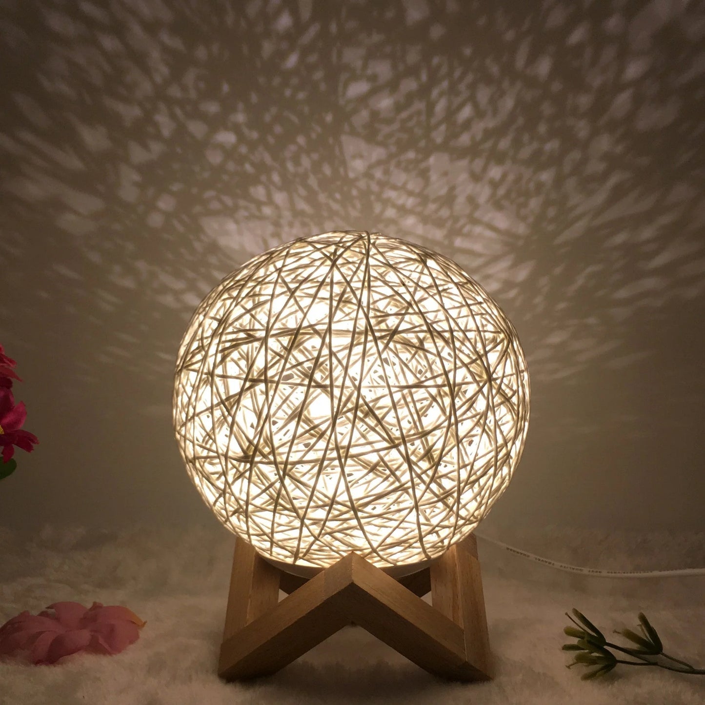 LED rattan table lamp with hand-knit linen shade in various colours