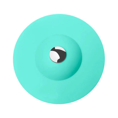 UFO-style silicone press sink drain cover in white, pink, gray, blue, and green