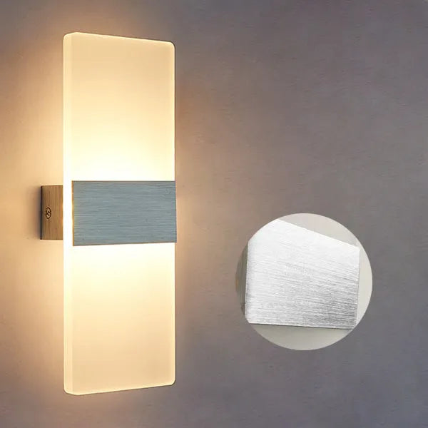Modern rectangular acrylic LED wall lamp in a choice of black, gold or silver finishes.