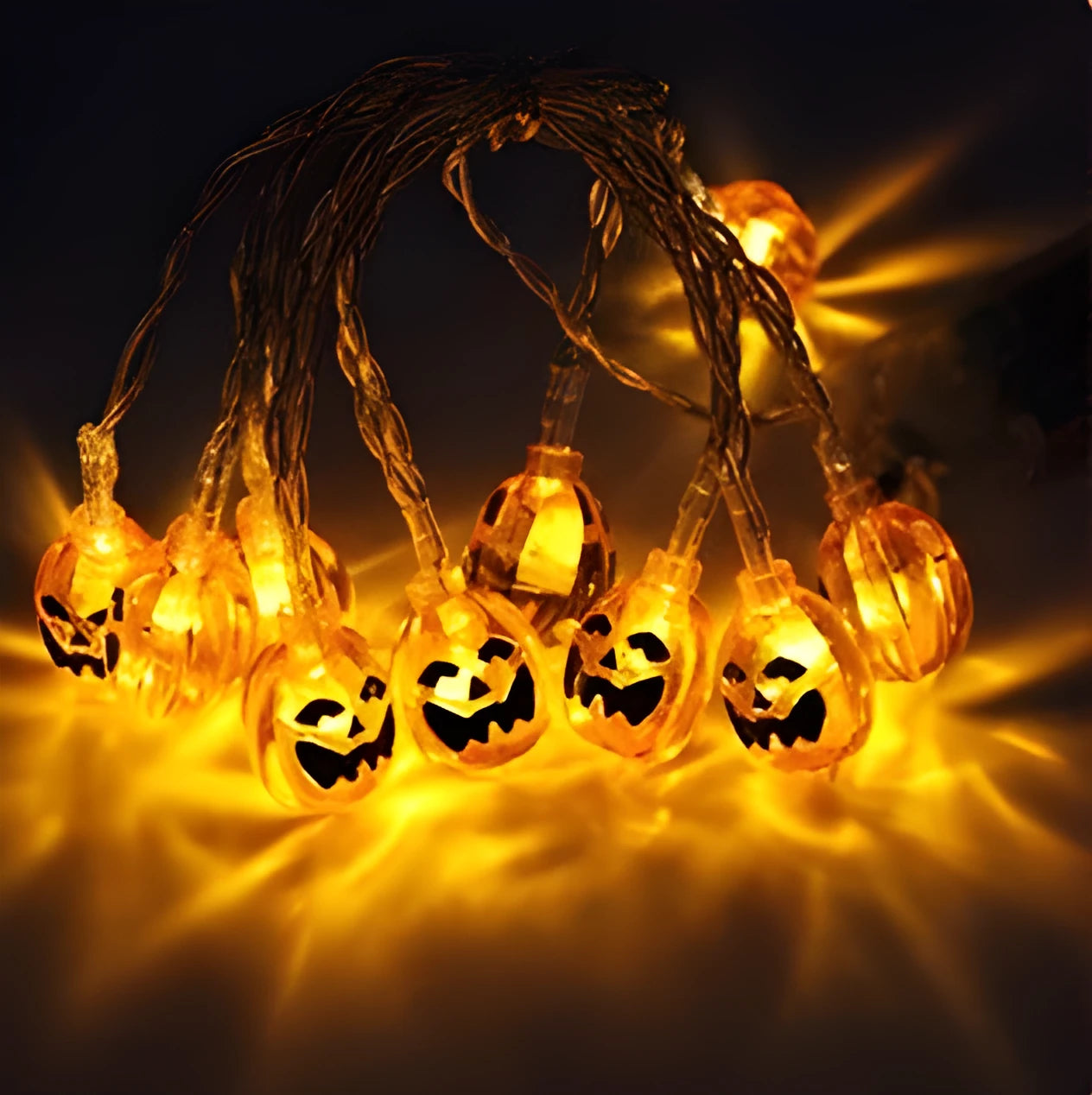 Halloween LED string lights with bat, ghost, and pumpkin pendants on a 1.2 metre white cable.