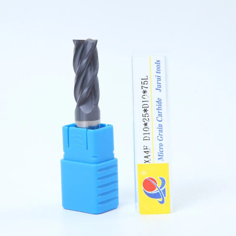 Set of straight shank carbide spiral milling cutters in various sizes on a workshop bench.