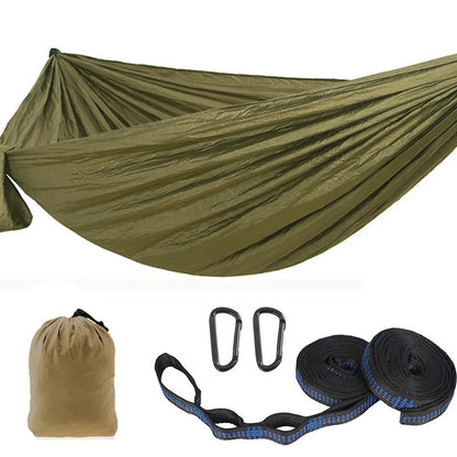 Parachute cloth double camping hammock in chosen colour, with black buckles and round ropes on a tree.