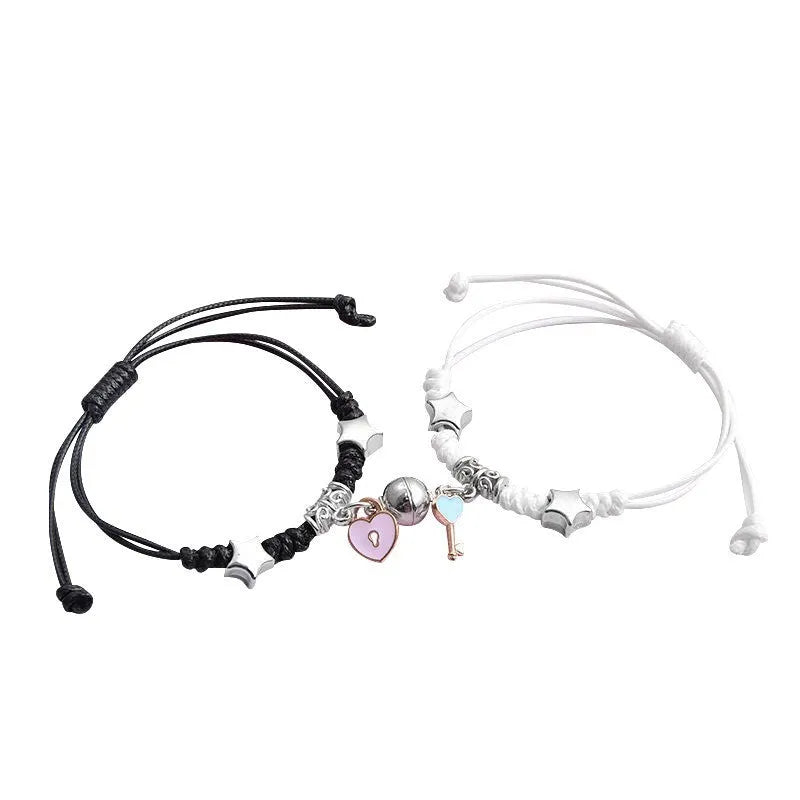 A pair of magnet couple bracelets with a suction clasp, showing various design options like clovers, crowns, and hearts.