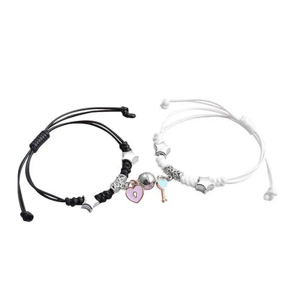 A pair of magnet couple bracelets with a suction clasp, showing various design options like clovers, crowns, and hearts.