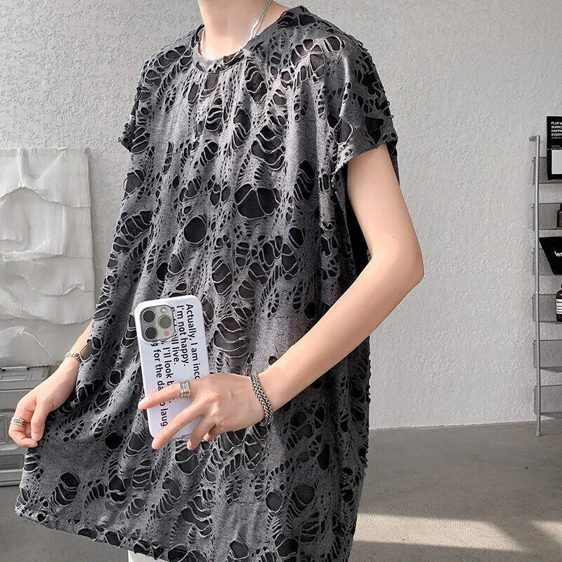 Black loose-fit sleeveless vest with ripped detail and wide shoulders, showcasing Japanese retro style.