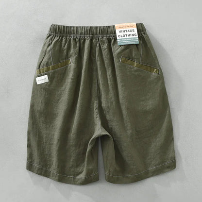 Men's linen shorts in loose straight drooping style with drawstring waist in green colour