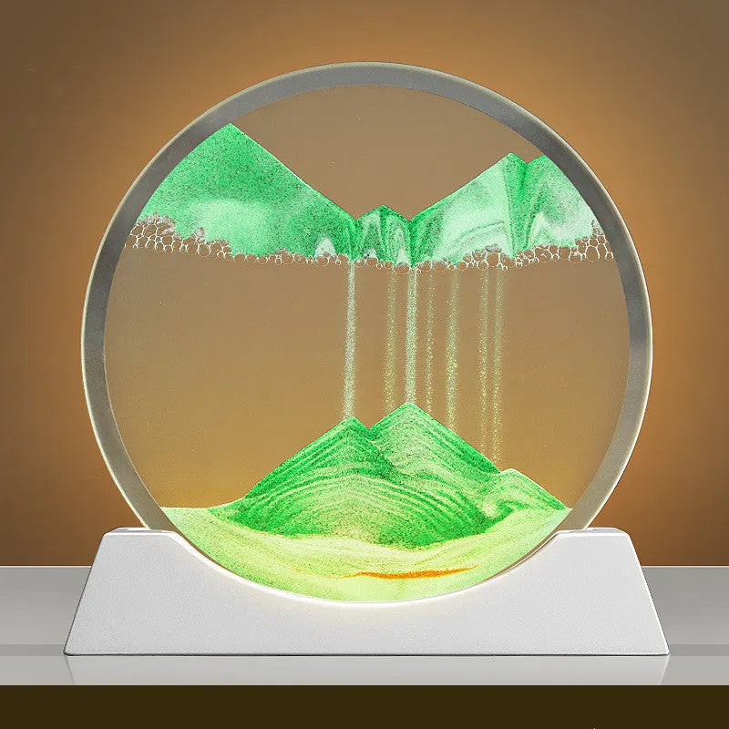Modern abstract quicksand painting rotary night lamp in blue, 12 inches tall on a desktop.