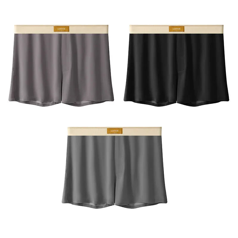 Pack of three pairs of solid colour men's ice silk briefs on a white background