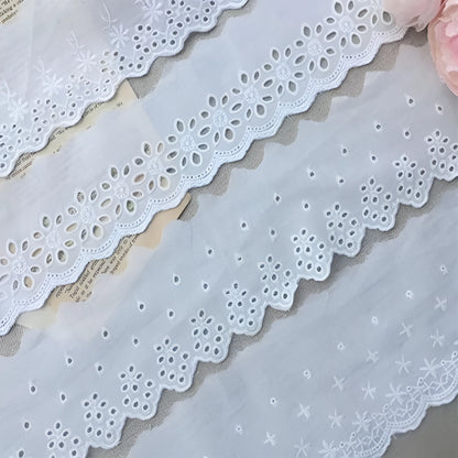 Cotton embroidered lace trim ribbon showing floral cutout patterns in four different width styles