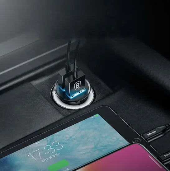 USB smart car charger with aluminium alloy casing in choice of colours, showing compact size for vehicle charging