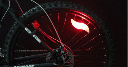 Bicycle Spokes LED Safety Lamp mounted on bike wheel, showcasing waterproof design