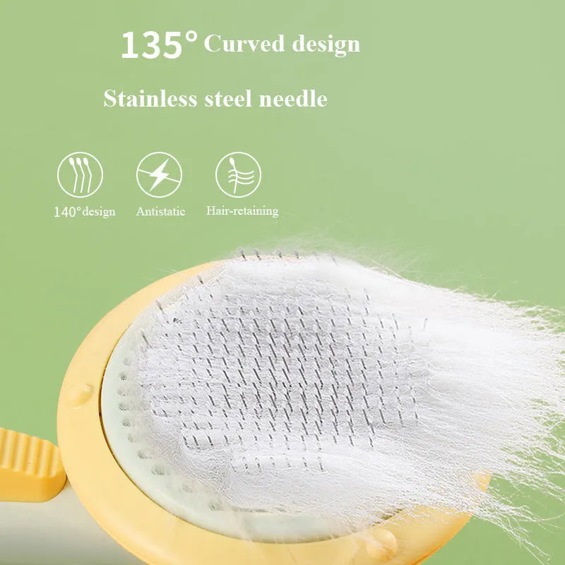 Hand-held pumpkin-coloured pet brush with stainless steel needles for grooming cats and dogs