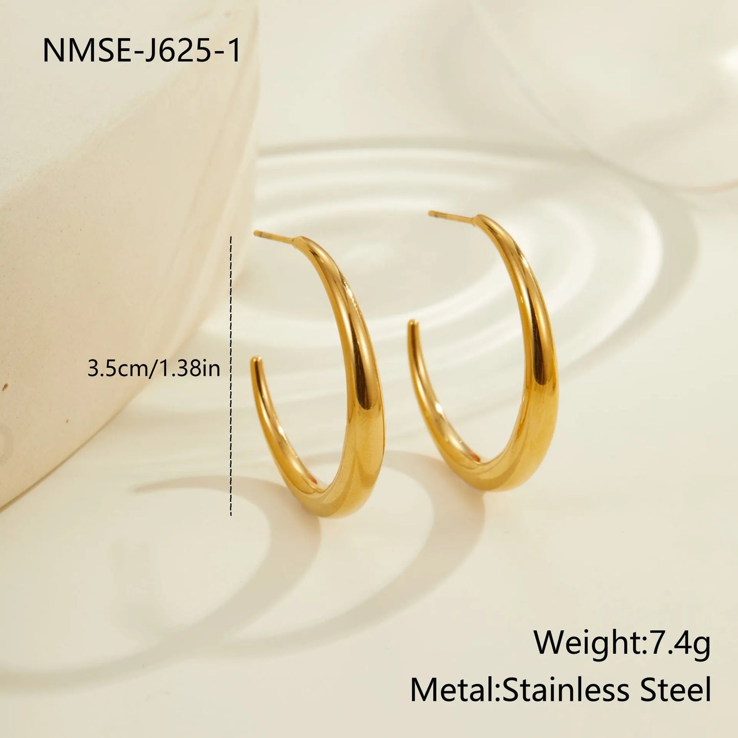 Titanium steel geometric round hoop earrings with 18K gold plating available in large and small sizes