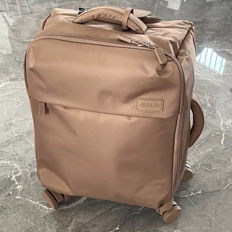 Ultra-light waterproof Oxford cloth suitcase in bluestone green with universal wheels showing 20-inch size dimensions