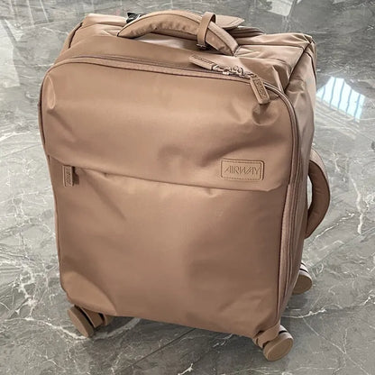 Ultra-light waterproof Oxford cloth suitcase in bluestone green with universal wheels showing 20-inch size dimensions