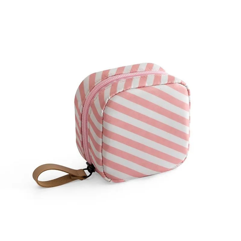 Cube-shaped cloth makeup storage bag in blue, pink, white, or white pink plain pattern for cosmetic organisation